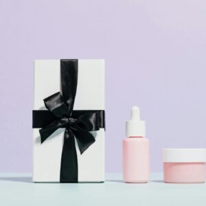Elegant display of beauty products with a gift box, perfect for marketing and promotion.
